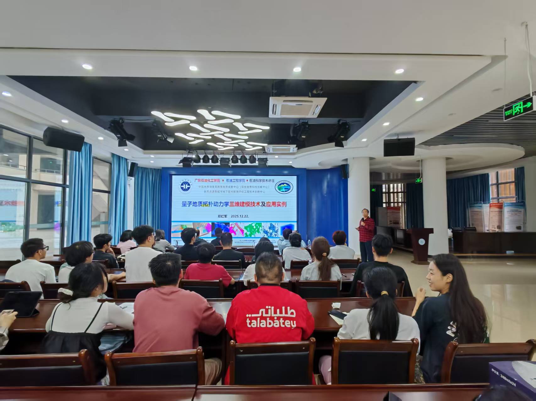 A group of people sitting in chairs in a roomAI-generated content may be incorrect.